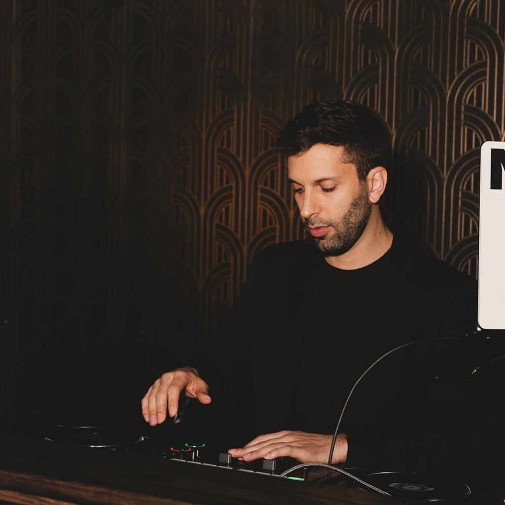 DJ Nugget performing behind the decks